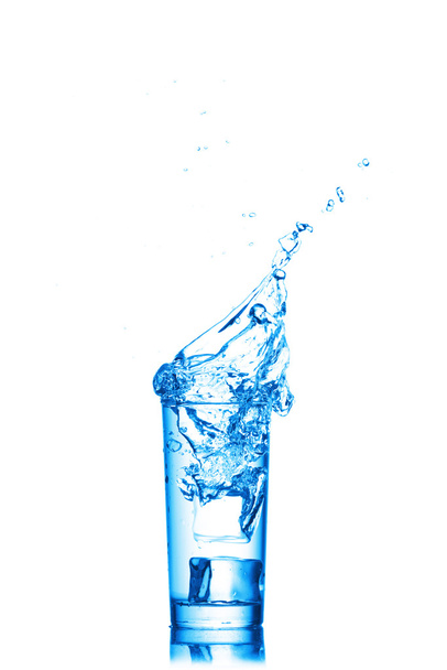 Water splashes in the glass on white background - Zdjęcie, obraz