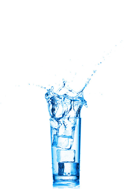 Water splashes in the glass on white background - Photo, Image