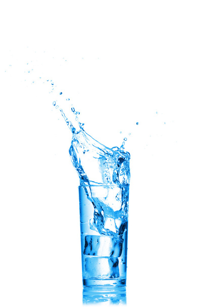 Water splashes in the glass on white background - Photo, image