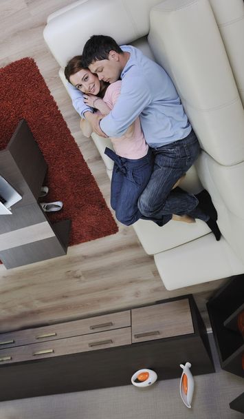 Couple relax at home on sofa - Foto, immagini