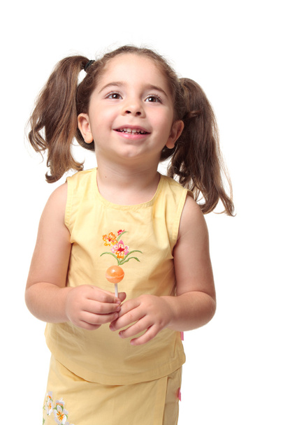 Feliz sonrisa niña preescolar en coletas
 - Foto, Imagen