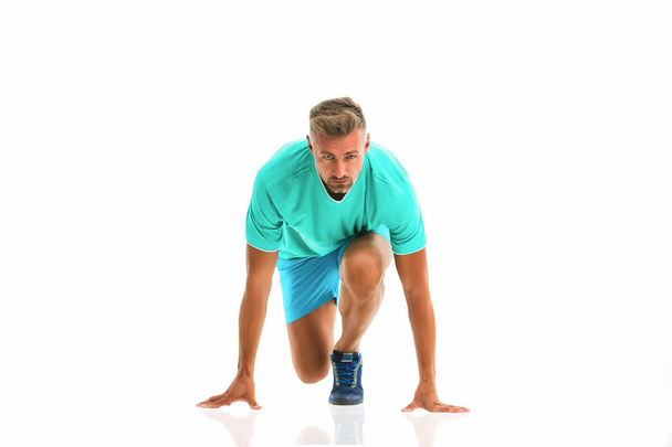 Ready steady go. Man sportsman start running. Runner handsome strong guy isolated on white. Workout training. Run faster. Running sport. Keep running every day. Healthy lifestyle. Gym run club - Foto, Imagem