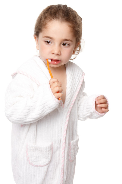 Pequena menina escova dentes - cuidados dentários
 - Foto, Imagem