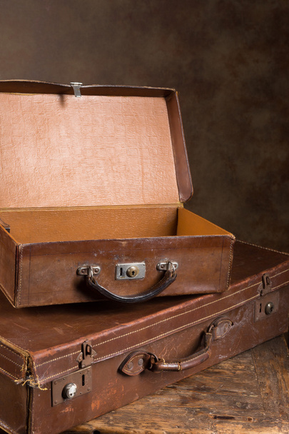 Antique open suitcases - 写真・画像