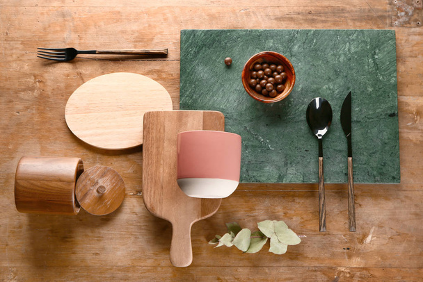 Different kitchenware on wooden background - Foto, Bild