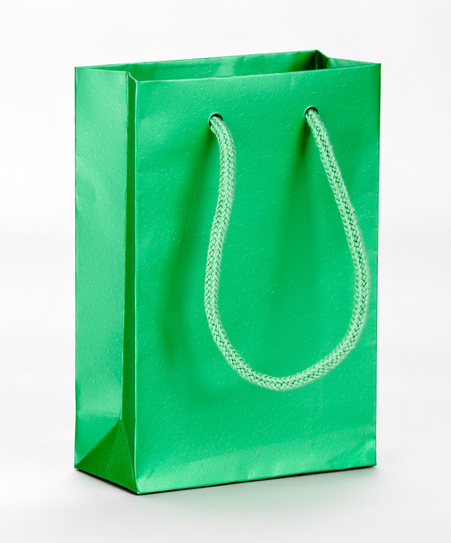 Одна зелена сумка для покупок
. - Фото, зображення
