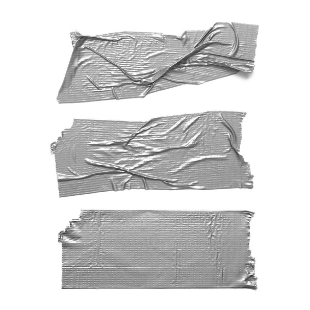 Duct tape pieces isolated on white background. Set of torn wrinkled silver grey adhesive tapes. - Photo, Image