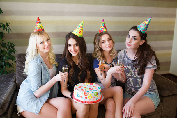 Birthday. Girls posing with cake on birthday - Photo, image