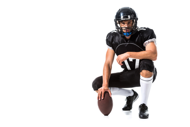 Giocatore di football americano in casco con palla isolato su bianco con spazio copia
 - Foto, immagini