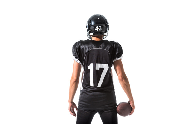visão traseira do jogador de futebol americano com bola isolada em branco
 - Foto, Imagem