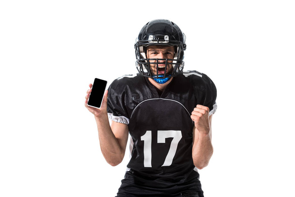 gritando jogador de futebol americano com smartphone isolado em branco
 - Foto, Imagem