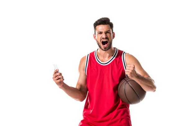 joueur de basket-ball avec balle et smartphone hurlant isolé sur blanc
  - Photo, image