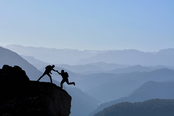 hegymászók a határozott harc, a siker és a látványos Mount - Fotó, kép