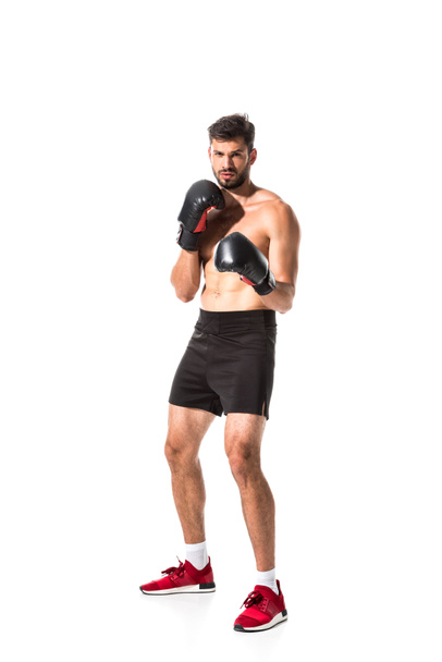gömleksiz Boxer ınboxing eldiven görünümlü kamera beyaz üzerinde Izole - Fotoğraf, Görsel