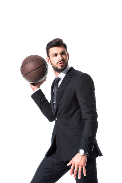 handsome businessman in formal wear holding basketball Isolated On White - Fotoğraf, Görsel