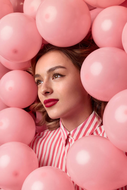 Dreamy female amidst balloons - Foto, Imagem