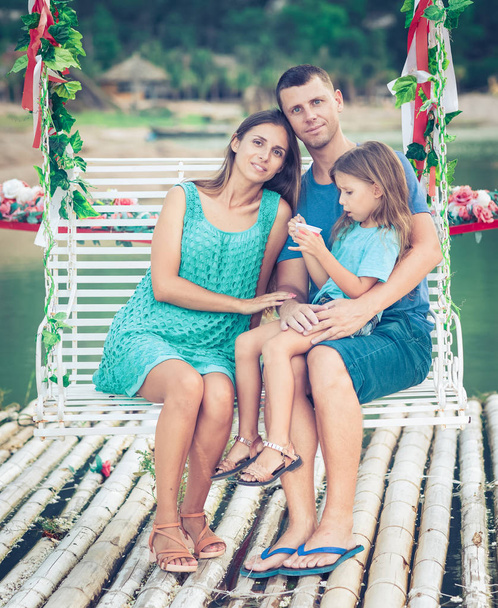 Outdoor portrait of a beautiful family - Photo, image