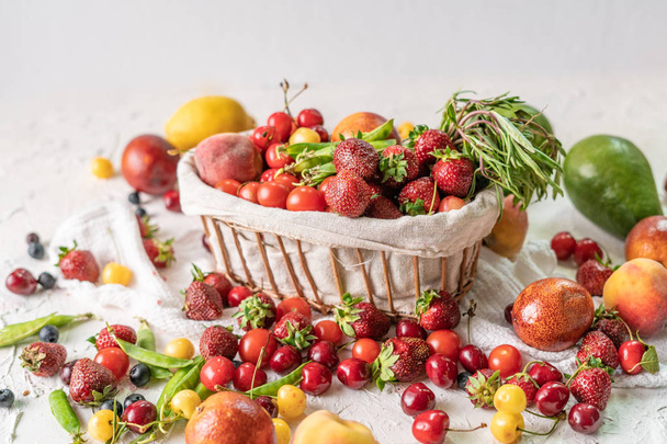 new seasonal variety of fresh fruits and vegetables grocery in basket - Fotó, kép