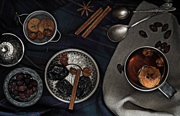 Various nuts and dried fruits in metal dishes on the table - 写真・画像