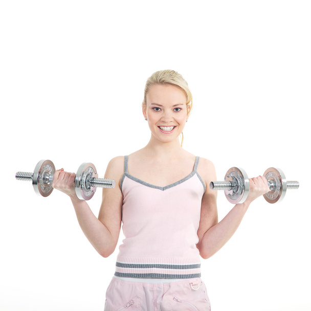 Fitness woman working out with dumbbell - Zdjęcie, obraz