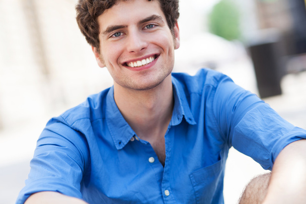Young man smiling - Photo, Image