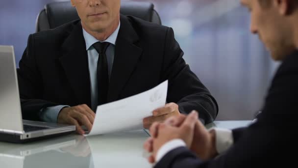 Company boss refusing job candidate putting resume on table, unqualified worker - Footage, Video