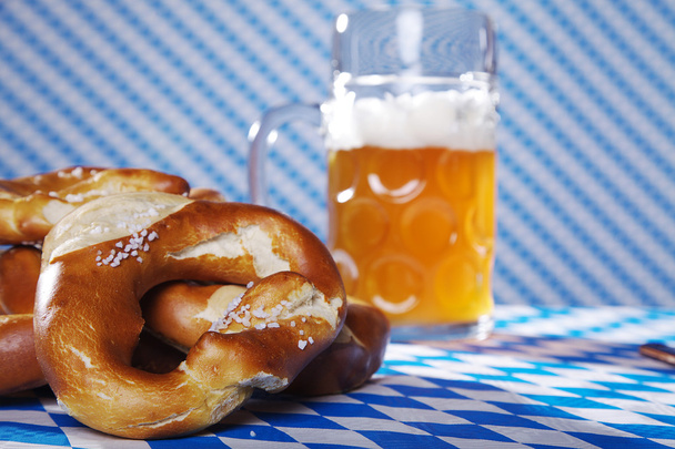 Pretzel and bear on the table - Foto, Imagen