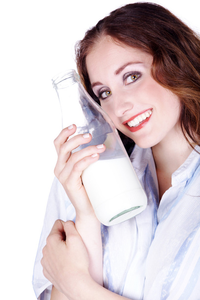 Attractive brunette with milk - Foto, afbeelding