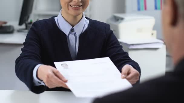 Male manager reading cv female job applicant, smiling woman looking interviewer - Felvétel, videó