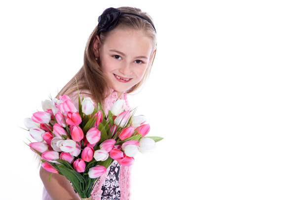 meisje met een boeket tulpen - Foto, afbeelding