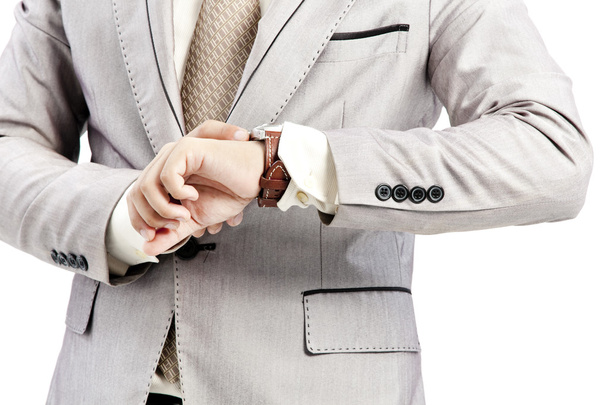 Businessman checking the time on his watch - Photo, Image
