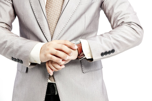 Businessman checking the time on his watch - Foto, imagen
