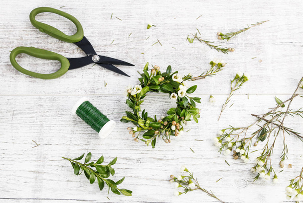 How to make easter wreath for egg with buxus and chamelaucium, t - Photo, Image