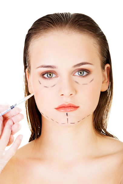 Cosmetic botox injection in the female face - Foto, afbeelding