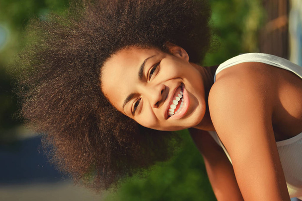 young happy and  pretty afro wooman closeup portrait on natural  - Photo, Image