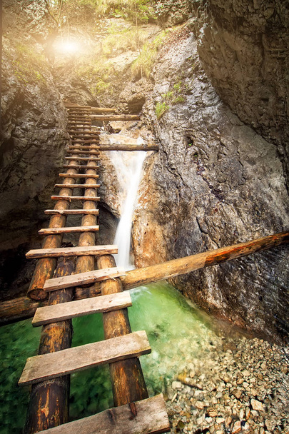 old wooden stairs over the mountain waterfall.natural background - Photo, Image