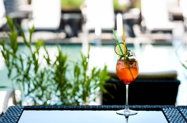 selective focus of table with cocktail on resort with copy space - Photo, Image
