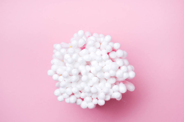 Cotton buds on pink background. Selective focus Copy space. - Photo, Image