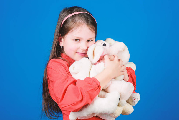 Playful beauty. toy shop. childrens day. Best friend. toys for kid. small girl with soft bear toy. hugging a teddy bear. little girl playing game in playroom. happy childhood. Birthday - Fotografie, Obrázek