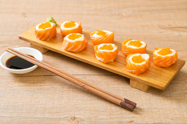 fresh salmon sushi roll with mayonnaise and shrimp egg - 写真・画像