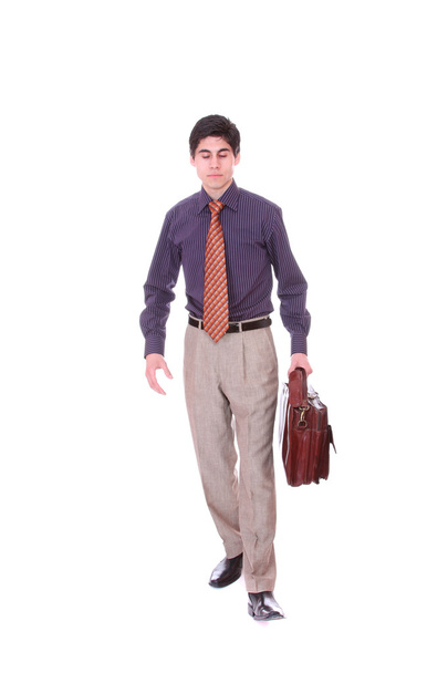 Businessman holding a briefcase. - Фото, зображення
