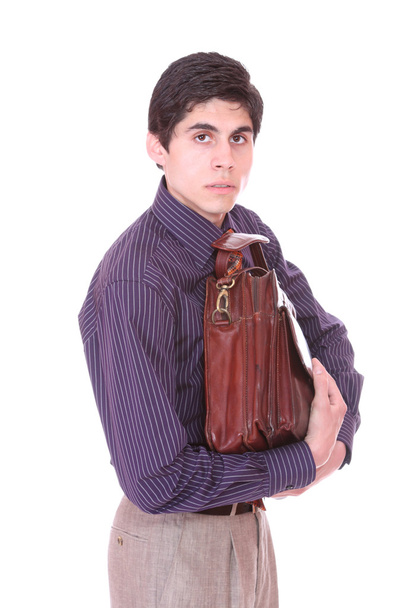 Businessman holding a briefcase. - Zdjęcie, obraz