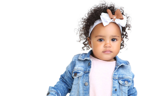 Beautiful baby girl in fashion clothing on white background - Fotó, kép