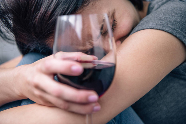 selective focus of depressed woman with wine glass at home - Photo, Image