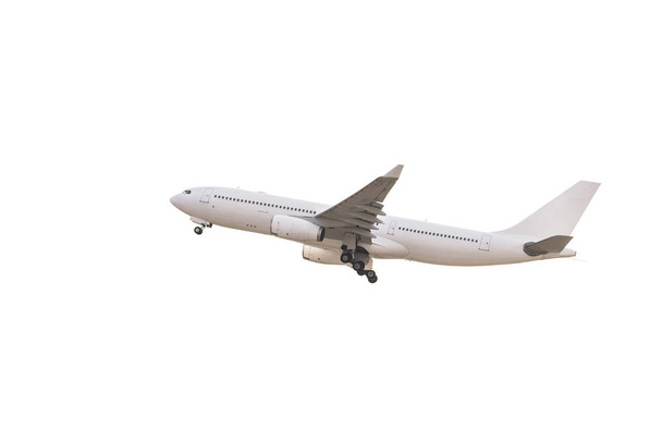 witte passagiersvliegtuig opstijgen - Foto, afbeelding