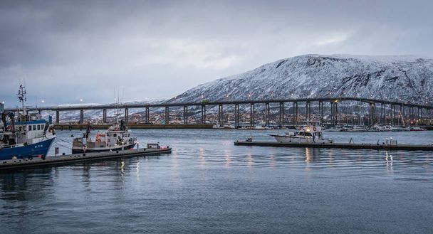 Tromso Bridge across Tromsoysundet strait and Tromso harbour - Fotografie, Obrázek