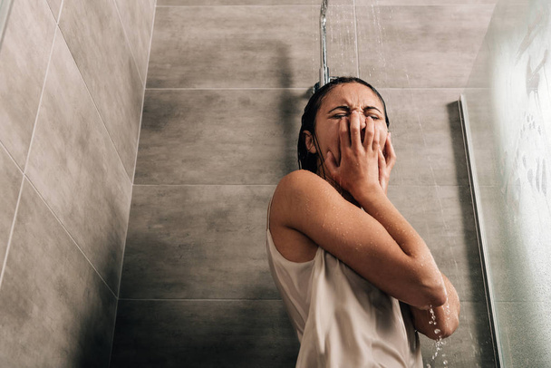 lonely sad woman crying in shower at home with copy space - Foto, Imagem