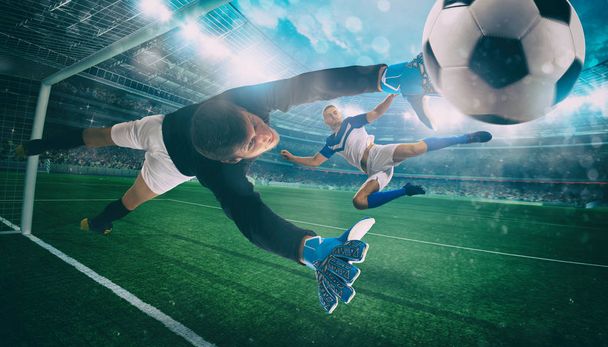 Goleiro pega a bola no estádio durante um jogo de futebol - Foto, Imagem