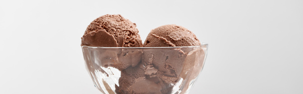 delicious chocolate ice cream in glass bowl isolated on grey, panoramic shot - Фото, изображение