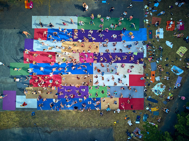 BIALOBRZEGI, POLAND - JULY 13-15, 2019: Beautiful panoramic aerial drone view on people having fun during concert on the Wibracje 3.0 Festival Poland - one of the biggest open air festivals in Poland - Photo, Image